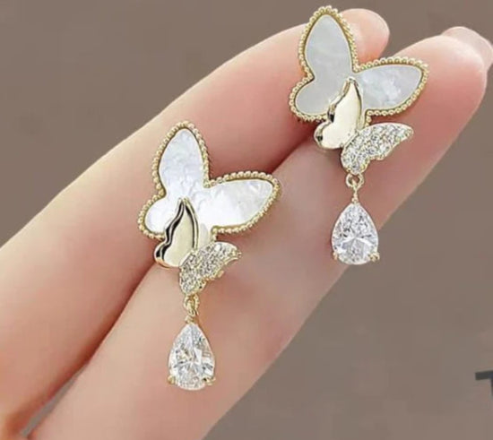 Elegant Double Butterfly Drop Earrings – Gold & White with Sparkling Teardrop Crystals