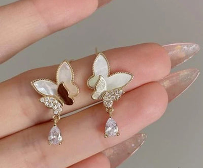 Elegant Double Butterfly Drop Earrings – Gold & White with Sparkling Teardrop Crystals