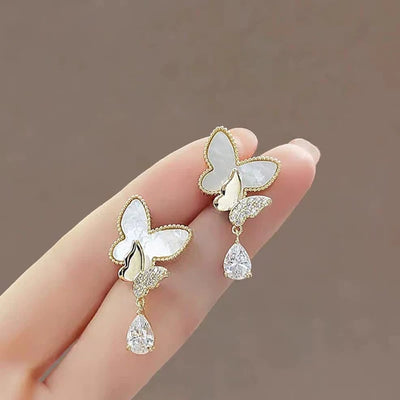 Elegant Double Butterfly Drop Earrings – Gold & White with Sparkling Teardrop Crystals