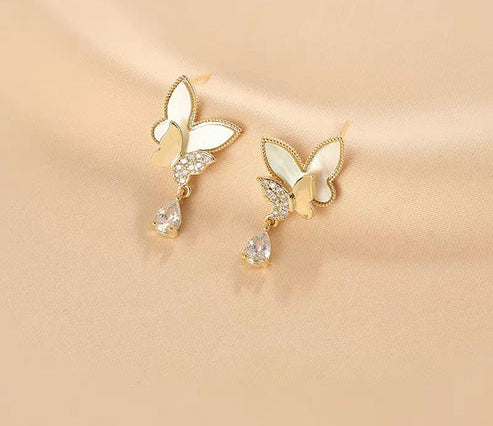 Elegant Double Butterfly Drop Earrings – Gold & White with Sparkling Teardrop Crystals